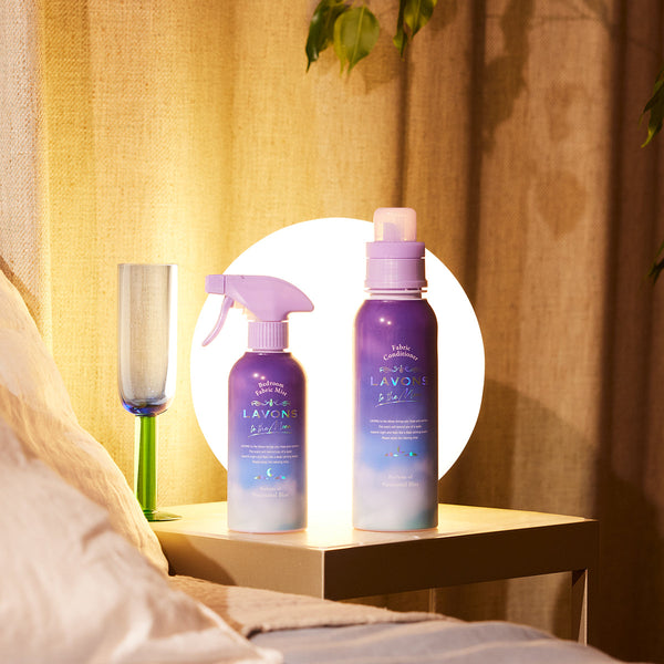 Nocturnal Blue fabric refresher & conditioner placed on a night stand